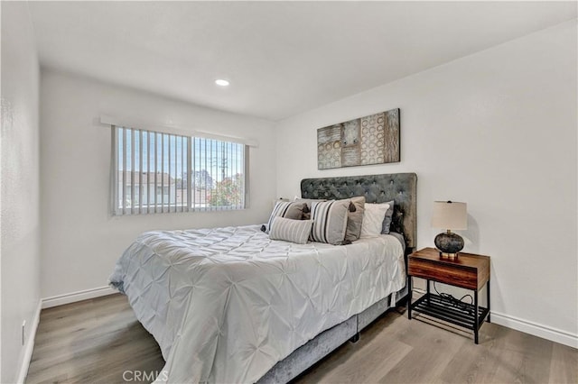 13338 Woodbrook Cir, Garden Grove, CA 92844 - bedroom with wood finished floors, baseboards, and recessed lighting
