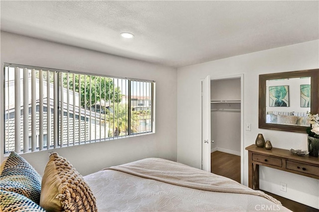 13338 Woodbrook Cir, Garden Grove, CA 92844 - bedroom with baseboards, a closet, recessed lighting, and wood finished floors