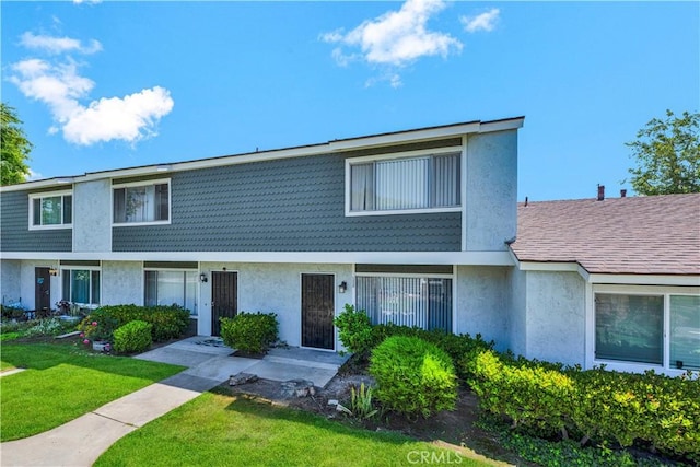 13338 Woodbrook Cir, Garden Grove, CA 92844 - view of property with stucco siding and a front yard