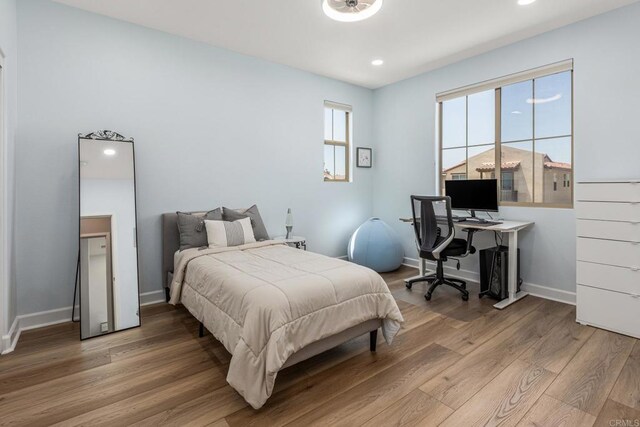 675 Westbrook Loop, San Marcos, CA 92078 - bedroom with light wood-style floors, baseboards, recessed lighting, and an office area