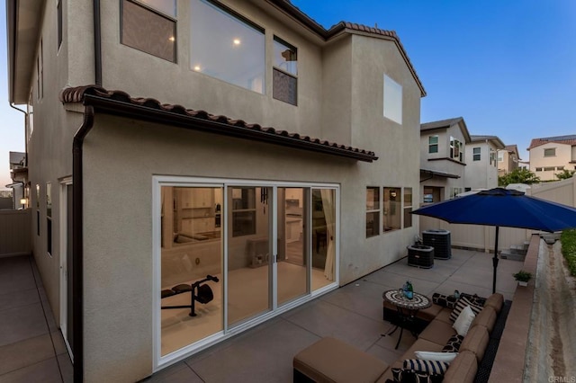 675 Westbrook Loop, San Marcos, CA 92078 - rear view of house featuring a patio, stucco siding, and central air condition unit