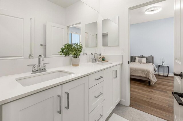 675 Westbrook Loop, San Marcos, CA 92078 - full bathroom with double vanity and tile patterned flooring