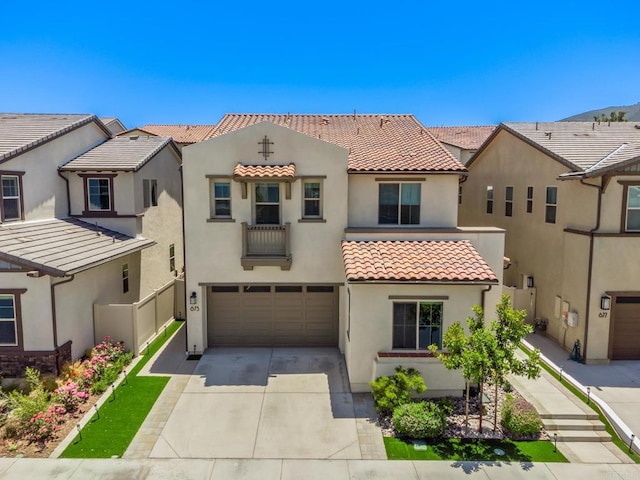 675 Westbrook Loop, San Marcos, CA 92078 - view of front facade with a tiled roof, stucco siding, concrete driveway, a garage, and a residential view