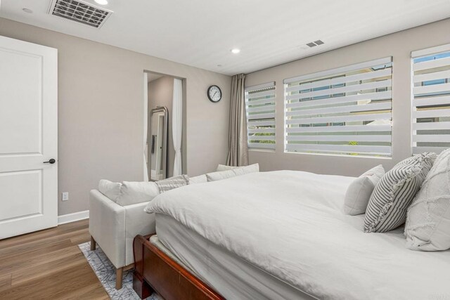 675 Westbrook Loop, San Marcos, CA 92078 - bedroom with wood finished floors, recessed lighting, and baseboards