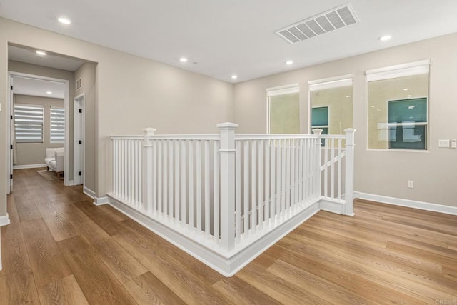 675 Westbrook Loop, San Marcos, CA 92078 - hall with an upstairs landing, wood finished floors, baseboards, and recessed lighting