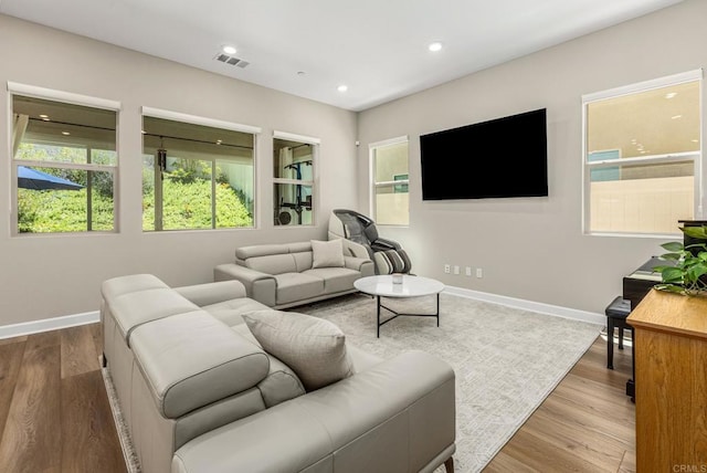 675 Westbrook Loop, San Marcos, CA 92078 - living area with baseboards, wood finished floors, plenty of natural light, and recessed lighting