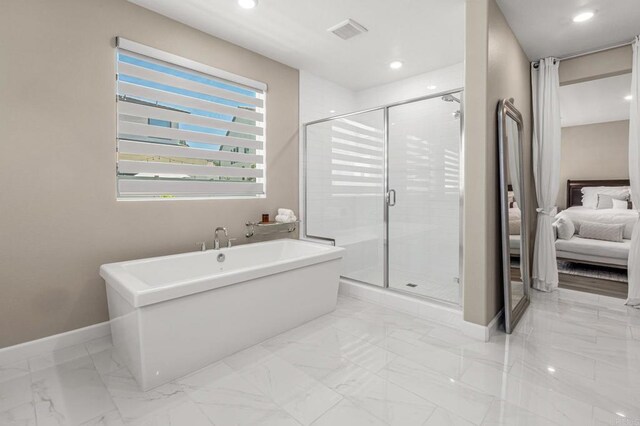 675 Westbrook Loop, San Marcos, CA 92078 - ensuite bathroom with a freestanding bath, baseboards, a shower stall, marble look tiles, and recessed lighting