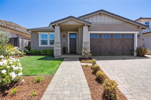 3207 Daisy Ln, San Luis Obispo, CA 93401 - craftsman inspired home with an attached garage, stucco siding, decorative driveway, and a front yard