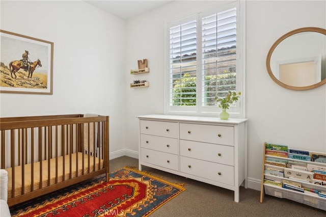3207 Daisy Ln, San Luis Obispo, CA 93401 - carpeted bedroom with a crib and baseboards