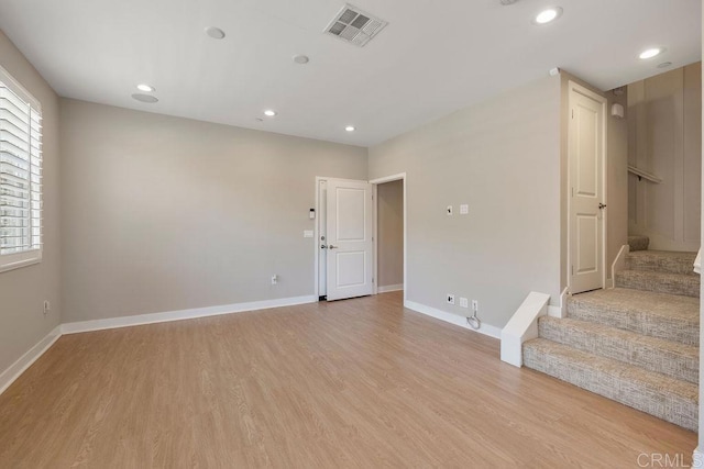 1105 Hibiscus Way, Oceanside, CA 92054 - spare room with light wood-style flooring, stairway, baseboards, and recessed lighting