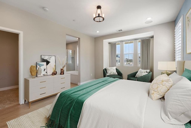 1105 Hibiscus Way, Oceanside, CA 92054 - bedroom featuring light wood-style flooring, multiple windows, and baseboards