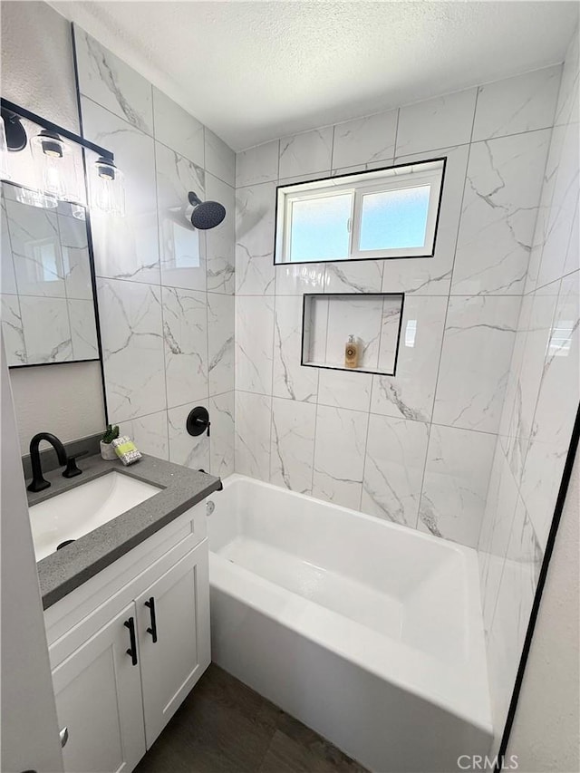9196 Redwood Ave, Fontana, CA 92335 - full bathroom featuring vanity, shower / bathtub combination, and a textured ceiling