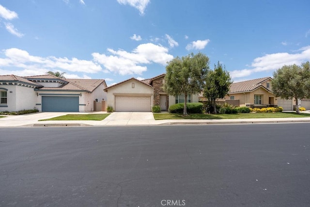 29557 Warmsprings Dr, Menifee, CA 92584 - view of front of property with stucco siding, an attached garage, concrete driveway, a residential view, and a tile roof