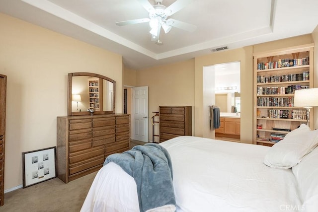 29557 Warmsprings Dr, Menifee, CA 92584 - bedroom with carpet, ensuite bath, ceiling fan, and a raised ceiling