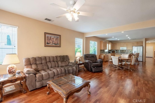 29557 Warmsprings Dr, Menifee, CA 92584 - living room with wood finished floors, ceiling fan, and recessed lighting