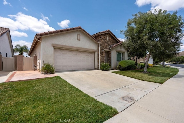29557 Warmsprings Dr, Menifee, CA 92584 - view of front of property with an attached garage, driveway, stone siding, stucco siding, and a gate