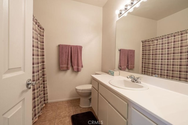 29557 Warmsprings Dr, Menifee, CA 92584 - bathroom with vanity, tile patterned flooring, toilet, and baseboards