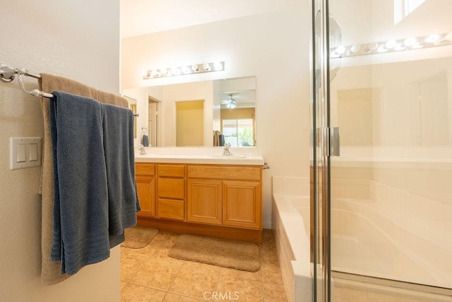 29557 Warmsprings Dr, Menifee, CA 92584 - bathroom featuring double vanity, tile patterned flooring, a bath, a shower with shower door, and a ceiling fan