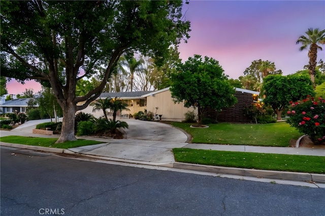 2201 Archdale St, Riverside, CA 92506 - view of front of house with curved driveway and a front yard