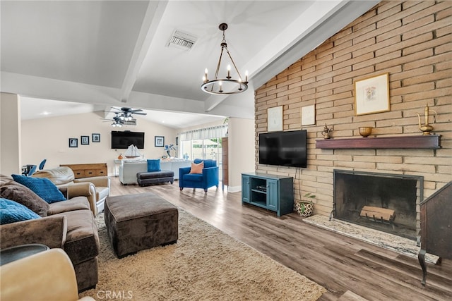 2201 Archdale St, Riverside, CA 92506 - living area with a fireplace, wood finished floors, a chandelier, and ceiling fan