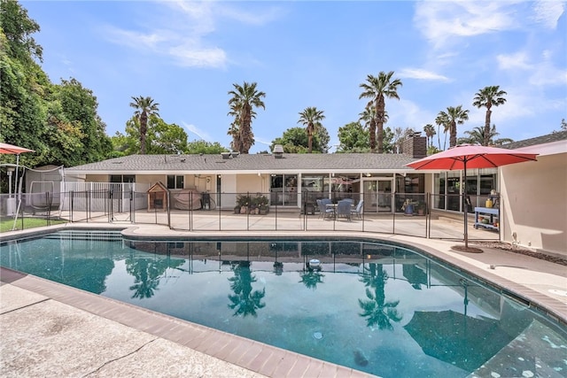 2201 Archdale St, Riverside, CA 92506 - view of swimming pool with a patio