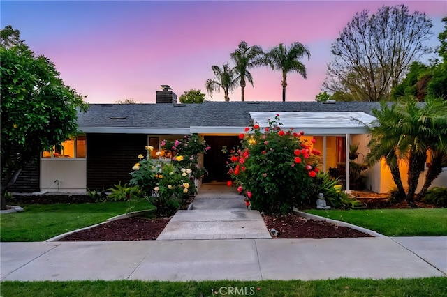 2201 Archdale St, Riverside, CA 92506 - single story home featuring a chimney and a lawn
