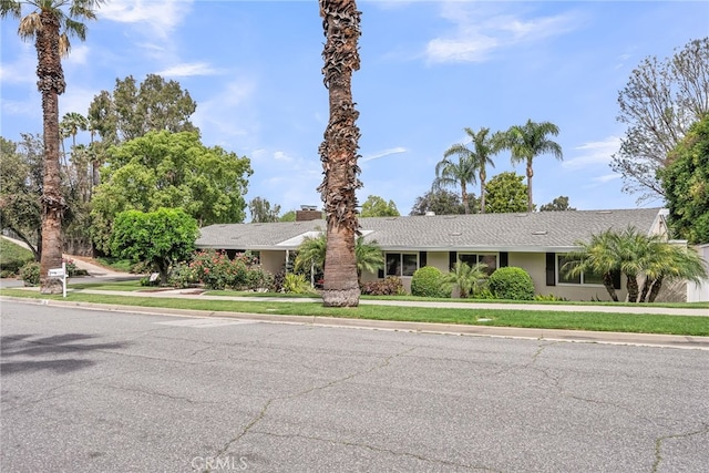 2201 Archdale St, Riverside, CA 92506 - single story home featuring a shingled roof, a front lawn, and a chimney