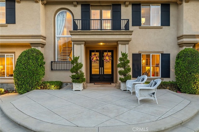 4160 New Hampshire Ave, Claremont, CA 91711 - entrance to property featuring stucco siding, a balcony, french doors, and a patio area