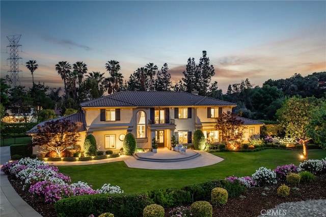 4160 New Hampshire Ave, Claremont, CA 91711 - mediterranean / spanish home with a chimney, a front lawn, stucco siding, and a tile roof