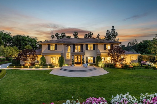 4160 New Hampshire Ave, Claremont, CA 91711 - view of front facade featuring french doors, stucco siding, a front yard, and a tiled roof