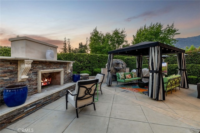 4160 New Hampshire Ave, Claremont, CA 91711 - view of patio featuring a gazebo and an outdoor living space with a fireplace