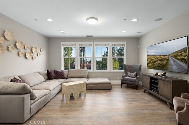 4160 New Hampshire Ave, Claremont, CA 91711 - living area featuring light wood-style flooring, recessed lighting, and baseboards