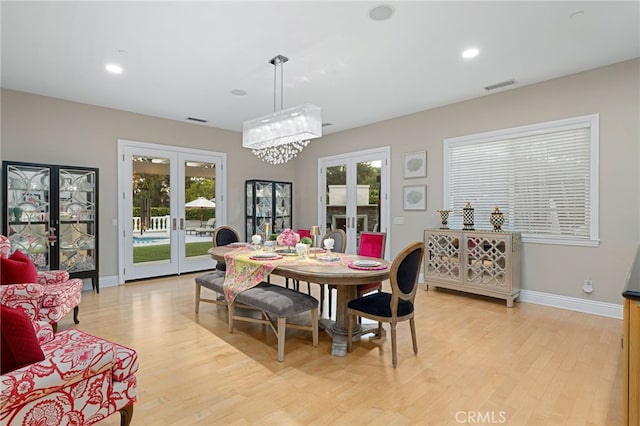 4160 New Hampshire Ave, Claremont, CA 91711 - dining space with french doors, plenty of natural light, light wood finished floors, baseboards, and recessed lighting