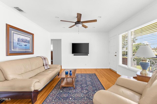 814 Brinsey Ave, Duarte, CA 91010 - living room with light wood finished floors, ceiling fan, baseboards, and ornamental molding