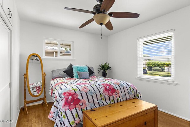 814 Brinsey Ave, Duarte, CA 91010 - bedroom featuring light wood-style floors, baseboards, and a ceiling fan