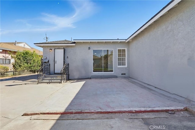 1509 W 138th St, Compton, CA 90222 - rear view of property with stucco siding and a patio area