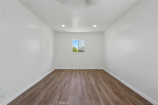 1509 W 138th St, Compton, CA 90222 - spare room with wood finished floors, baseboards, and recessed lighting