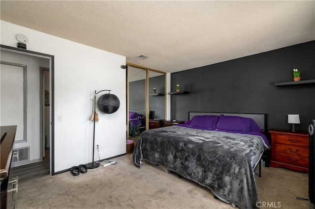 23621 Suncrest Ave, Moreno Valley, CA 92553 - bedroom with carpet, a closet, and a textured ceiling