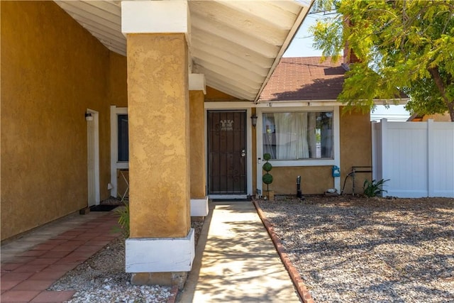 23621 Suncrest Ave, Moreno Valley, CA 92553 - doorway to property featuring stucco siding