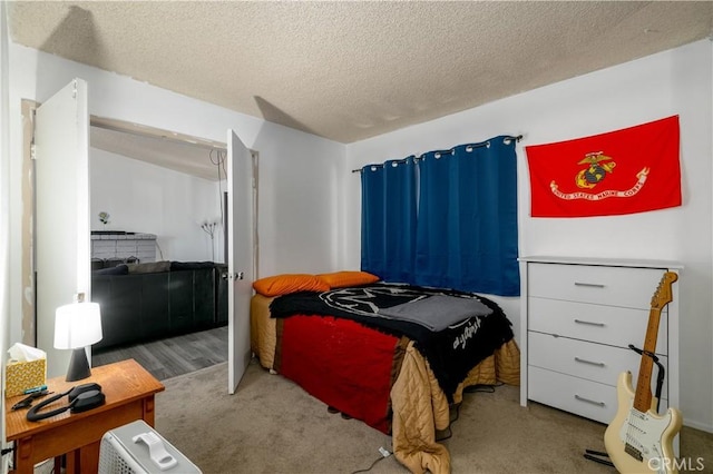 23621 Suncrest Ave, Moreno Valley, CA 92553 - bedroom with a textured ceiling and carpet flooring