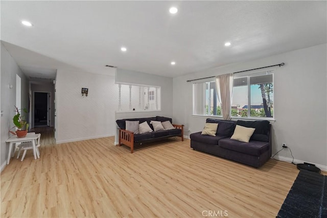 7558 Lobos Ave, Hesperia, CA 92345 - living room with baseboards, wood finished floors, and recessed lighting