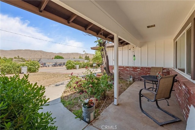 7558 Lobos Ave, Hesperia, CA 92345 - view of patio / terrace with a mountain view
