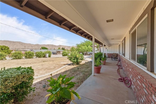 7558 Lobos Ave, Hesperia, CA 92345 - view of patio / terrace with a mountain view