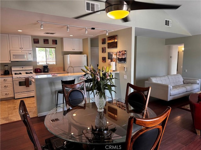 1351 E Gem Cir, Palm Springs, CA 92262 - dining room featuring track lighting and wood finished floors