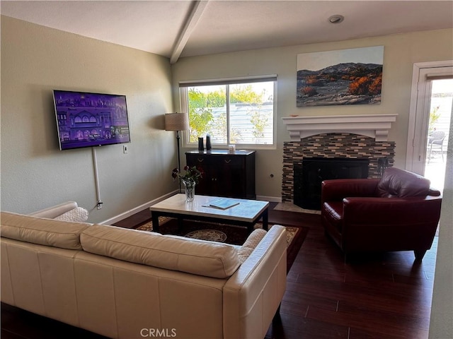 1351 E Gem Cir, Palm Springs, CA 92262 - living room featuring beam ceiling, wood finished floors, healthy amount of natural light, and a stone fireplace