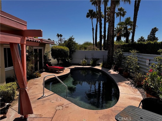 1351 E Gem Cir, Palm Springs, CA 92262 - view of pool with a fenced backyard and a patio area
