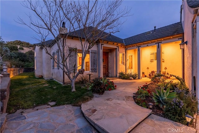 26525 Carancho Rd, Temecula, CA 92590 - view of front of property featuring a chimney and stucco siding
