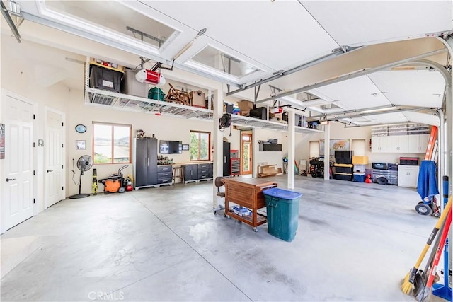 26525 Carancho Rd, Temecula, CA 92590 - garage featuring a garage door opener