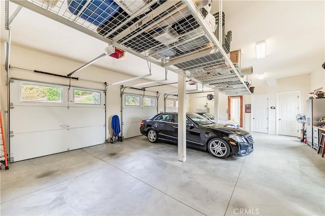 26525 Carancho Rd, Temecula, CA 92590 - garage featuring a garage door opener
