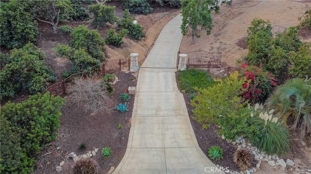 26525 Carancho Rd, Temecula, CA 92590 - view of yard with a gate and concrete driveway